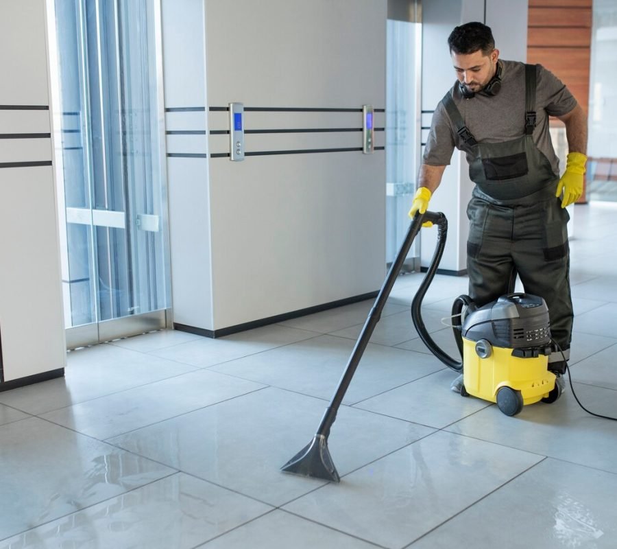 full-shot-man-vacuuming-office-floor_23-2149345550 full-shot-man-vacuuming-office-floor_23-2149345550